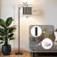 Lampe sur pied à arc avec abat-jour réglable noir et blanc avec rayures verticales et design minimaliste