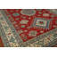 Tapis rouge à motif oriental Kazak