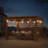 Sunjoy Pergola 11 x 13 ft. Steel Frame Pergola with Tan Adjustable Sling Fabric Canopy