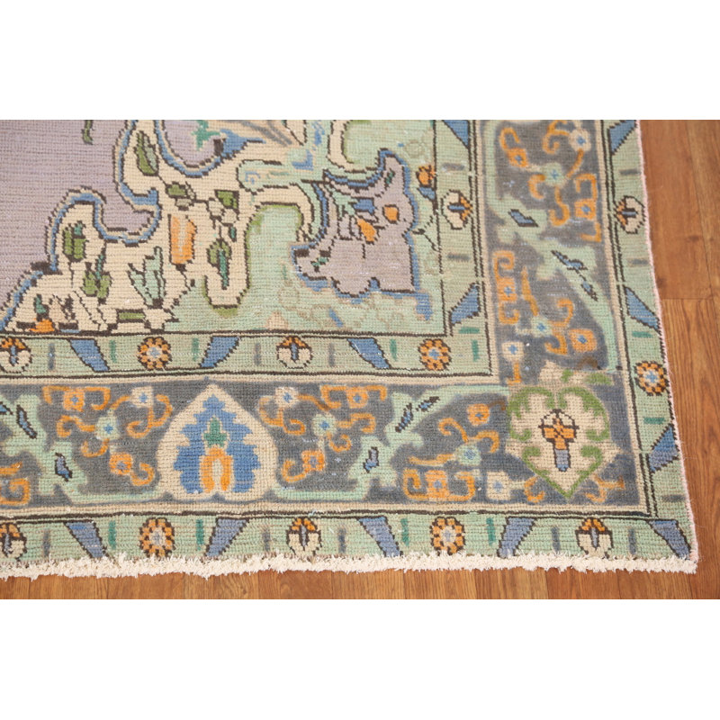 Tapis traditionnel en laine mauve clair 7 x 9
