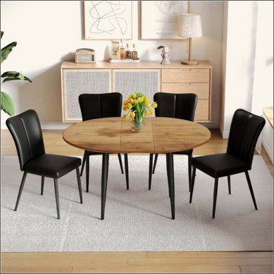 Table And Chair Set.Modern Extendable Wood MDF Dining Table.Suitable For Gatherings Of Different Size.Paried With 4 Black PU Chairs With A Vertical Stripe Design On The Backrest And Black Metal Legs.