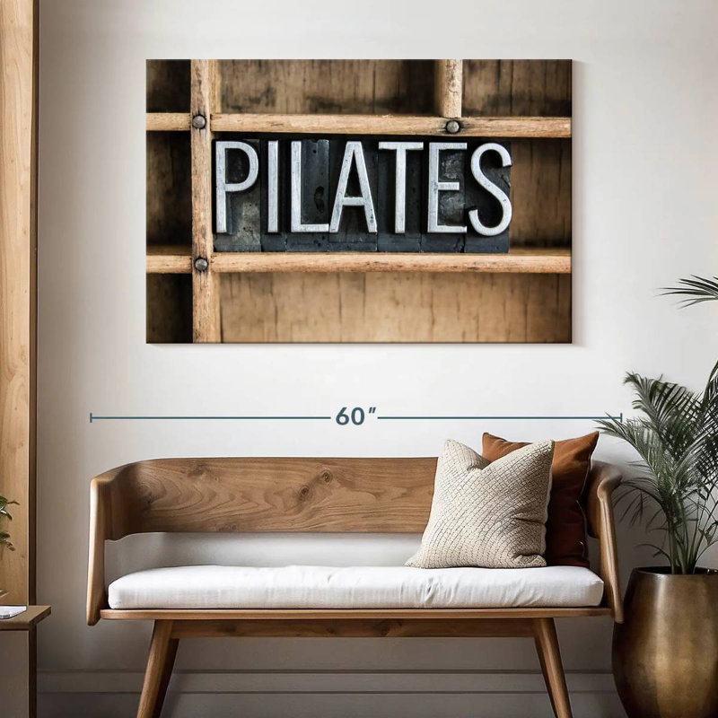 Pilates, typographie en métal
