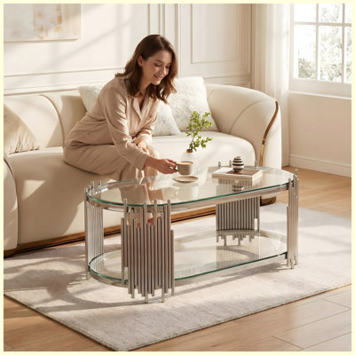 Table basse ovale de luxe moderne argentée avec tablettes en verre trempé à 2 niveaux, structure en acier inoxydable poli avec conception de tuyau d'orgue artistique 47 po x 23,6 po x 17,7 po