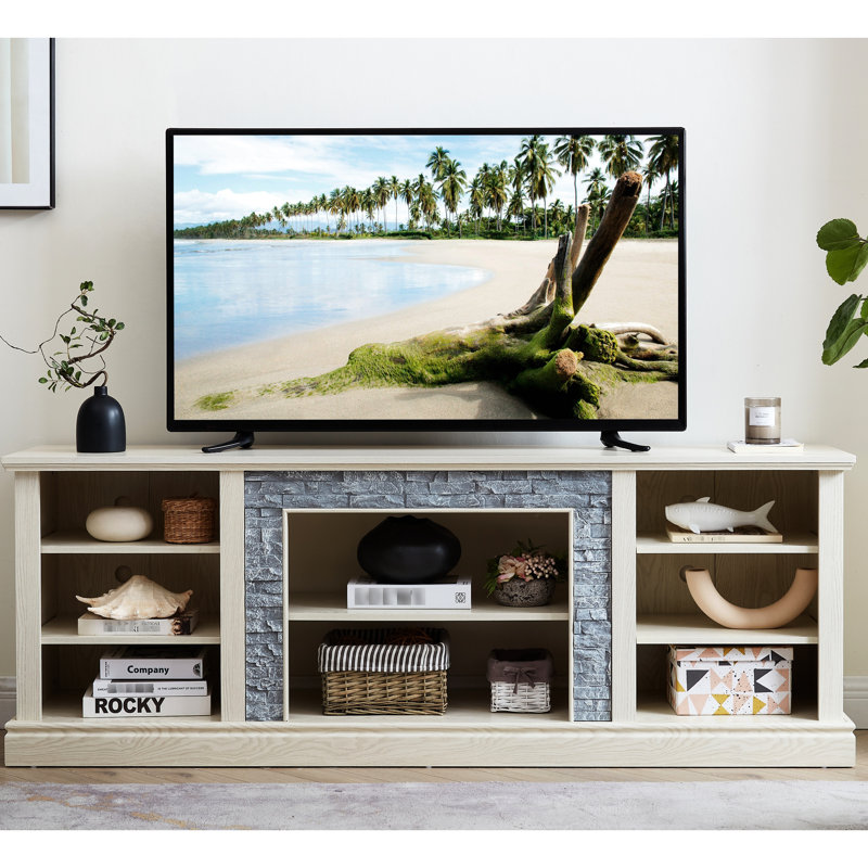 La console de télévision en simili pierre blanche est compatible avec les téléviseurs de 75 po et les gadgets.