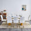 Ensemble de table et de chaises rectangulaire large avec plateau en verre à motif de pouces et grands pieds de table en bois aggloméré avec chaises avec sièges rembourrés en similicuir et pieds en métal