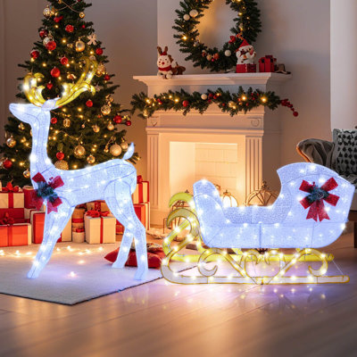 Renne de Noël illuminé et traîneau avec 215 lumières DEL blanches et 8 piquets de sol blanc froid