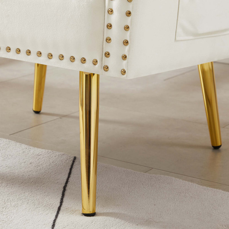 Fauteuil en velours avec pieds en métal
