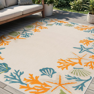 Coastal Border Ivory/Multi Indoor/Outdoor High-Low Area Rug