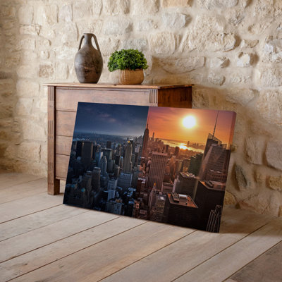 Canvas A Breathtaking Urban Skyline At Sunset Showcasing A Dramatic Contrast Wall Art Between Day And Night On The Left The City Is Canvas Wall Art
