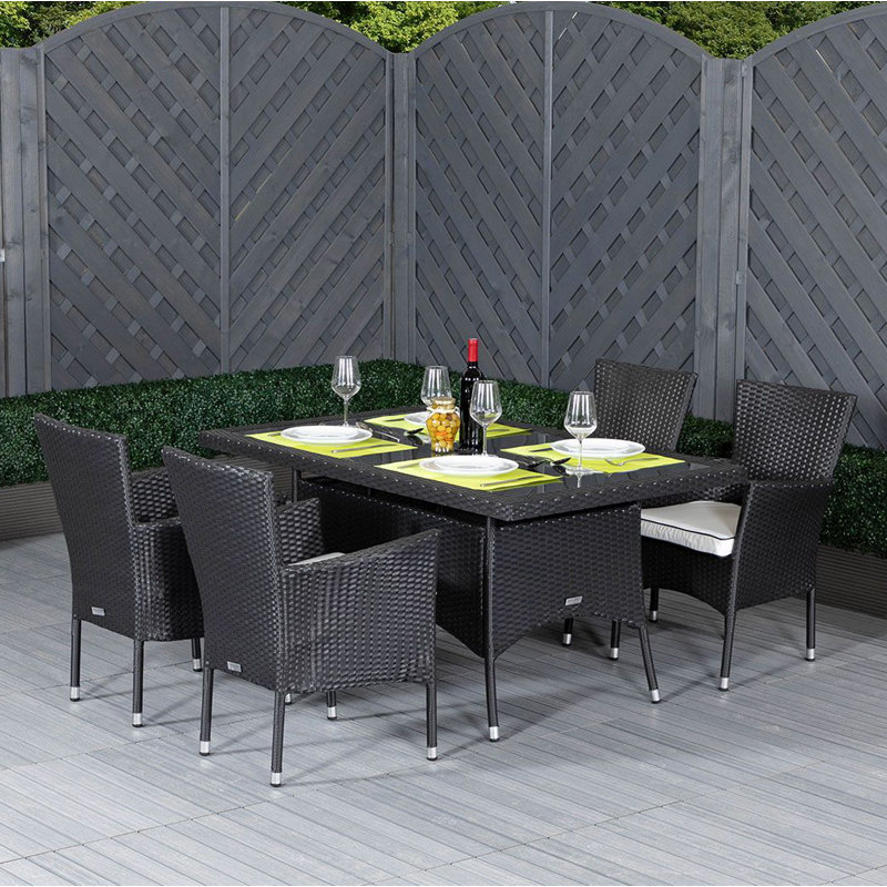 Escobedo 4 - Person Patio Dining Set with Rectangular Table , Cushions Included