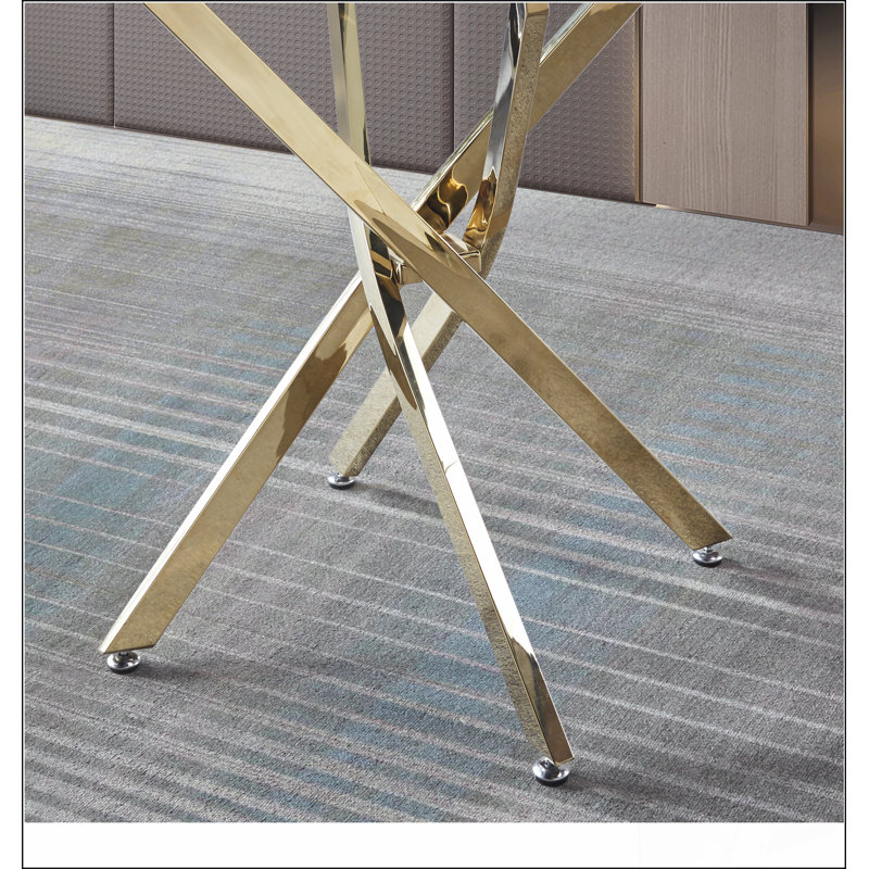 Table de salle à manger ronde en verre transparent, pieds à finition dorée Essentiel à la maison, durable et robuste, et attrayant