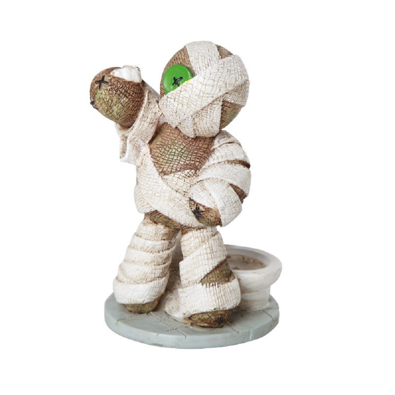 Figurine de siège pooh et de toilette momie