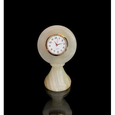 Horloge sur socle en onyx blanc