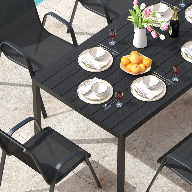 Ballynure Rectangular Patio Dining Set with Faux Wood Dining Table and 6 Stackable Textilene Chairs, Black/Black