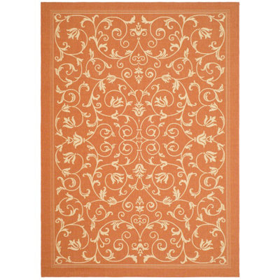 Tapis terre cuite / naturel à motif floral Arneshia
