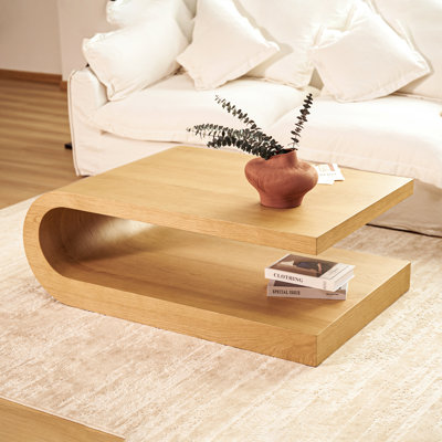 Table basse Arcus de 48 po en chêne naturel avec piètement incurvé en forme de C, table de salon moderne