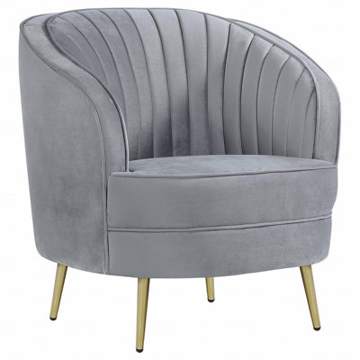 Chaise capitonnée grise et dorée