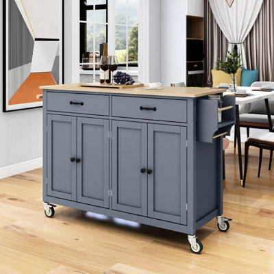 Îlot de cuisine en bleu avec surface en bois massif et armoires, armoire à 4 portes, 2 tiroirs, porte-épices et porte-serviettes, roues de couleur verrouillable, porte-étagère,