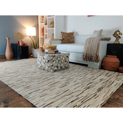 Mensa Cowhide Southwestern Indoor Rug