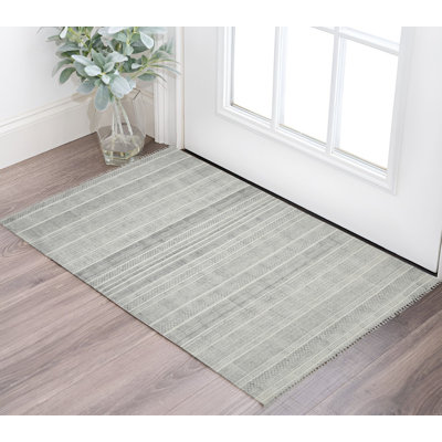 Tapis ivoire et noir tissé à plat à la main 2 pi x 3 pi avec franges