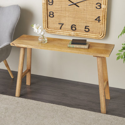 Banc brun en bois de manguier fabriqué à la main