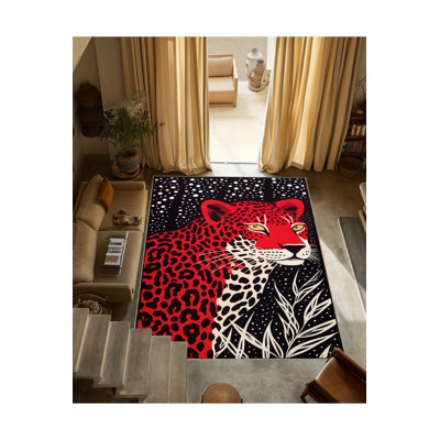 Tapis noir et rouge à motif léopard abstrait et lavable de la collection Waso