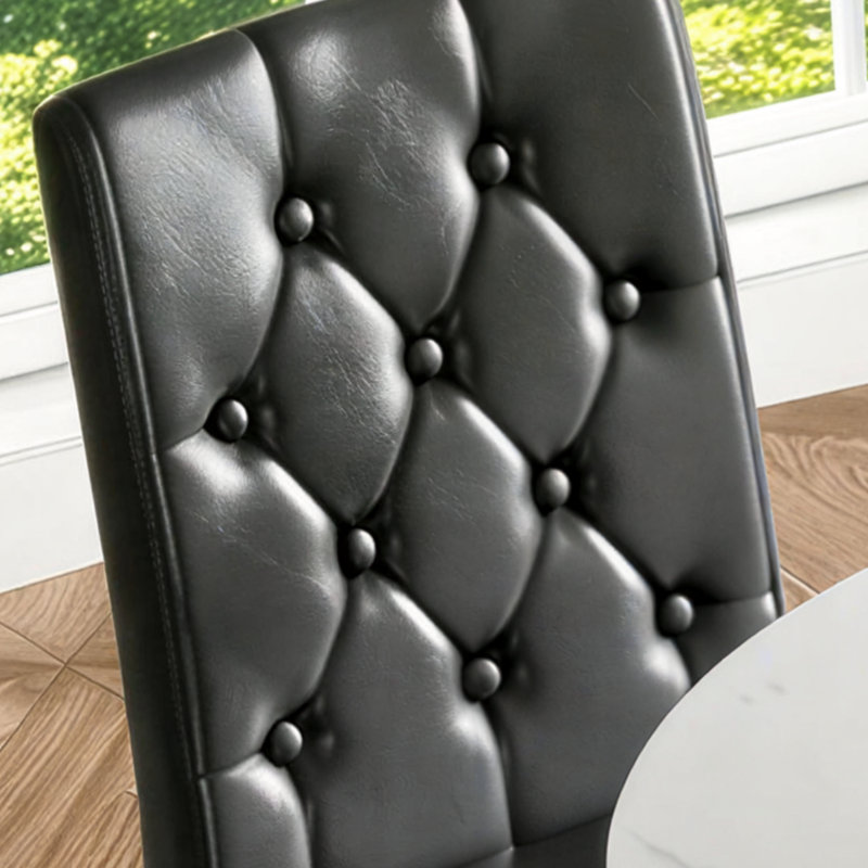 A 47.6-Inch Round White MDF Dining Table With A Black Hourglass Metal Frame And Four Ergonomic Buckle PU Dining Chairs.