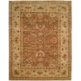 Devansh Wool Oriental Area Rug in Brown/Beige