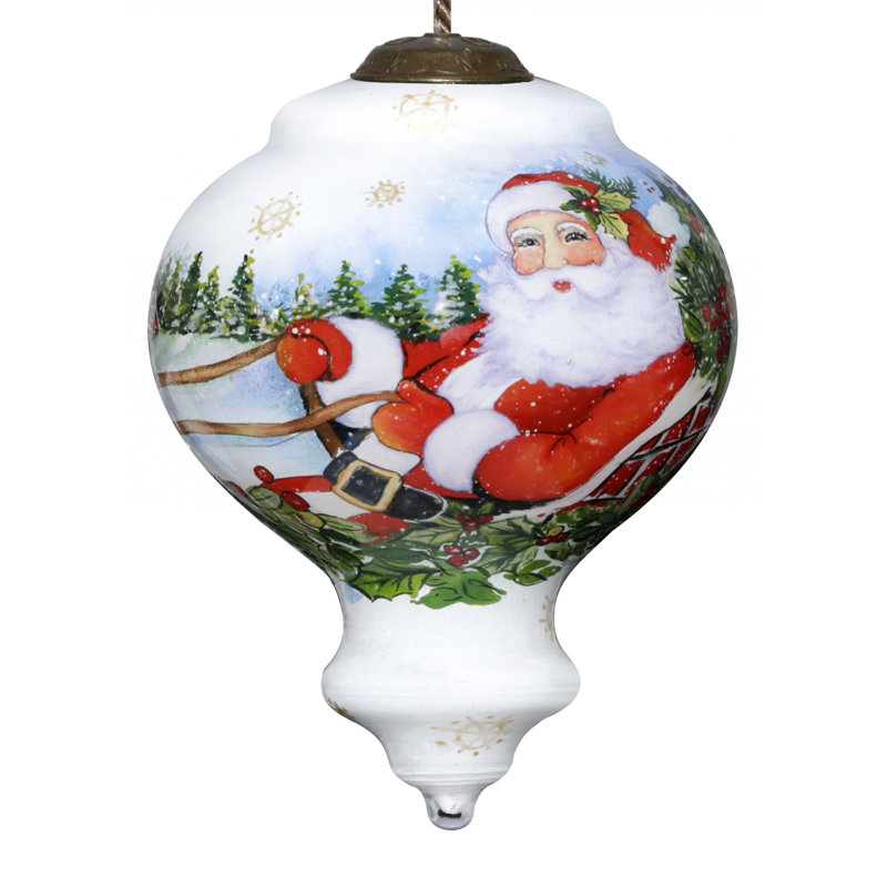 Ornement père Noël chevauchant un traîneau