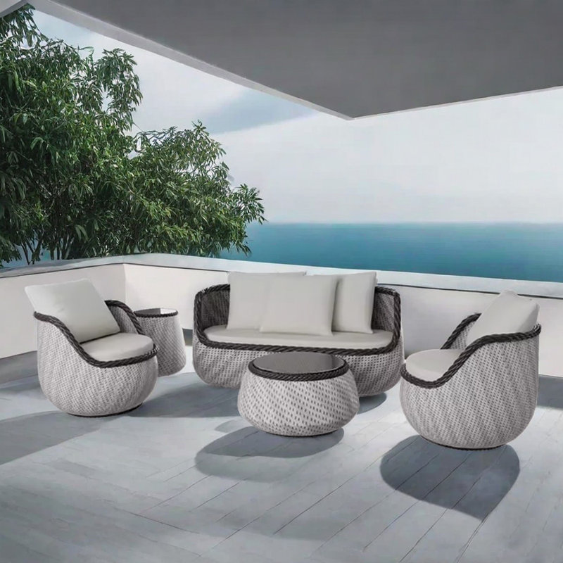 Korwin Wicker 4 - Person Patio Conversation Set with Cushions