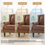 Fauteuil à oreilles en similicuir brun rembourré avec garniture cloutée Duward-374568035
