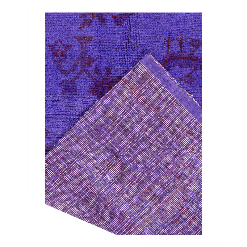 Weda Geometric Area Rug in Purple