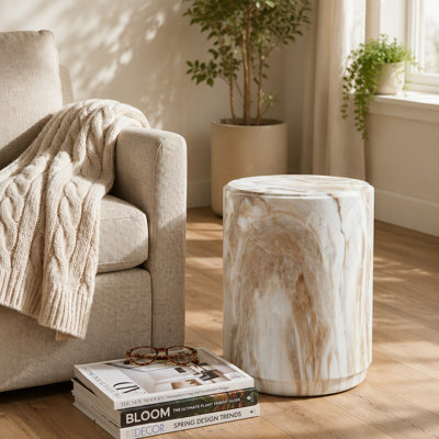 Tabouret d'appoint sculptural aspect marbre avec finition pierre