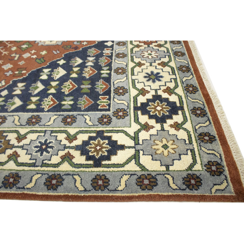 Tapis oriental rouille 9 x 12
