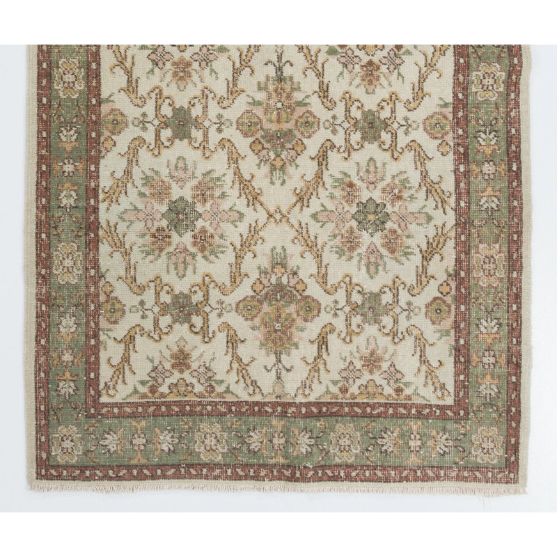 Tapis à motif floral fait à la main