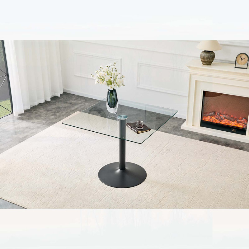 Table de salle à manger minimaliste avec base en métal à colonne unique, idéale pour les espaces compacts et une utilisation polyvalente.