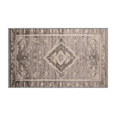 Tapis gris soyeux et moelleux