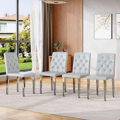 4-Piece Ergonomic PU Dining Chair Set with Buckle Backrest, Adjustable Anti-Slip Feet, and Premium Cushioned Seat for Comfort and Durability.