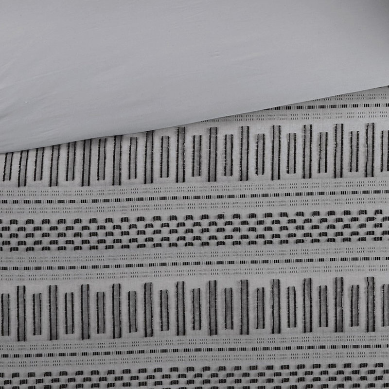 La taie décorative en coton gris / noir ajoute un flair décoratif pour rehausser la qualité de la literie