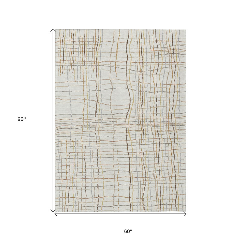 Tapis extérieur lavable rayé brun et doré 5 pi x 8 pi ivoire