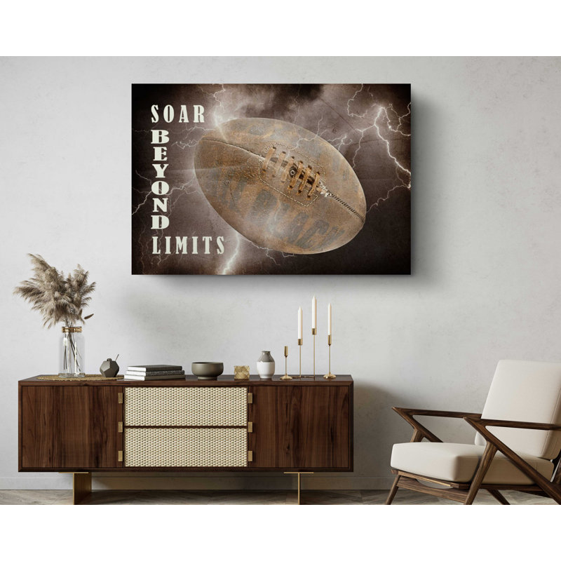 Impression sur toile «Soar Beyond Limits Rugby Ball Motivation», 16" H x 24" W