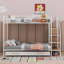 Lit superposé simple au-dessus d'un lit double en métal avec échelle de rangement et armoire latérale-104650535