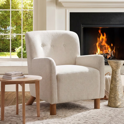 Fauteuil d'appoint Haven en lin capitonné avec accoudoirs, idéal pour le salon et le coin lecture.