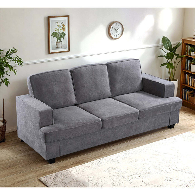 Canapé en velours confortable et élégant avec coussins moelleux pour vous détendre et créer un espace de vie confortable