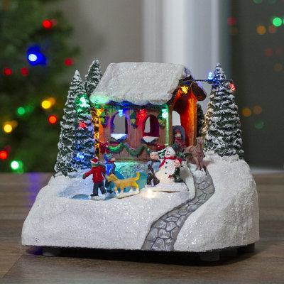 7.5" White Lighted LED Musical Christmas Ice Skating Village Tabletop Decor