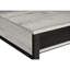 Bureau d'ordinateur assis-debout en stratifié gris avec étagères, 122 cm (48 po) de long, base en métal noir, usage bureau/maison, rangement intégré.
