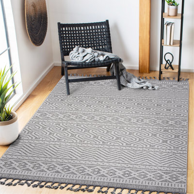 Tapis intérieur / extérieur gris / blanc / géométrique