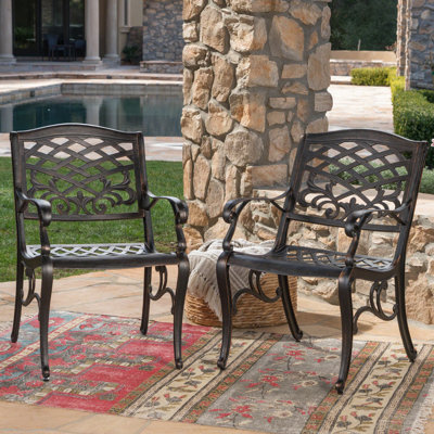 Arm Chair  2  - Graceful Legs And Floral Design Rust- Aluminium Construction 27.05" W X 21.83" D 34.2" H Assembly Required Accents Pattern