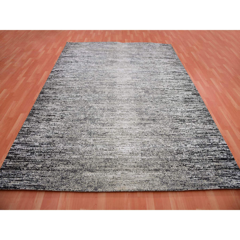 Tapis noir en laine New Age Caprisha