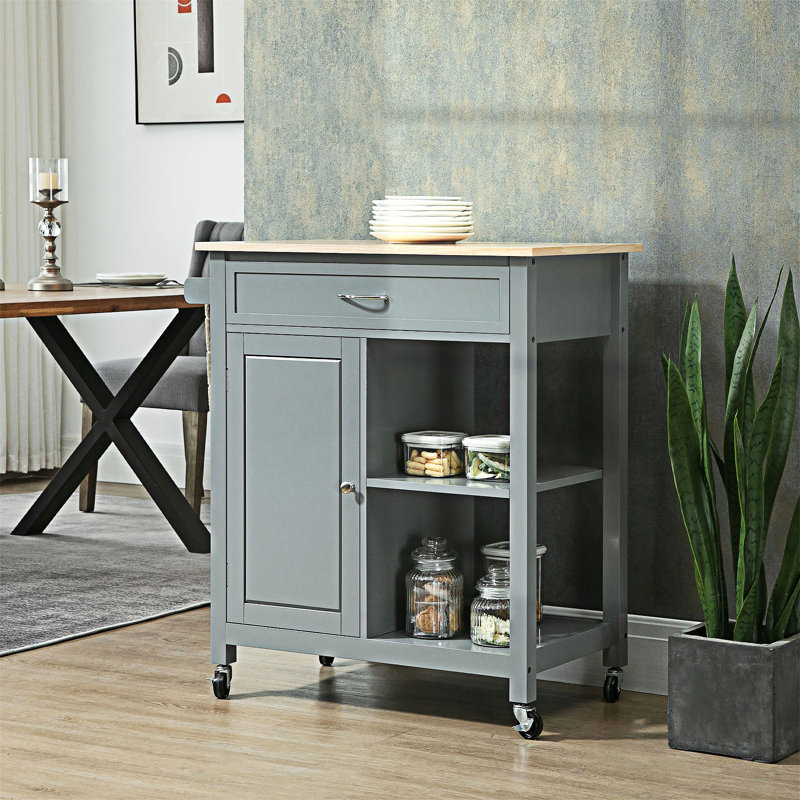 Îlot de cuisine roulant avec rangement spacieux et tablettes réglables pour un espace de cuisine fonctionnel et élégant.